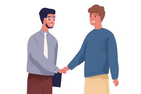 Zwei Männer stehen sich gegenüber und geben sich die Hand. 
